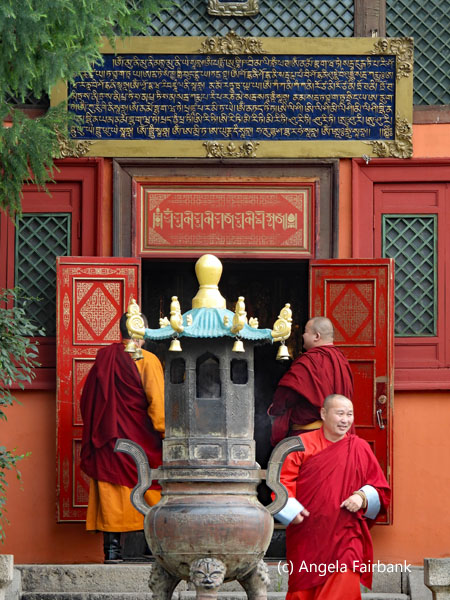 monks at entrance to temple