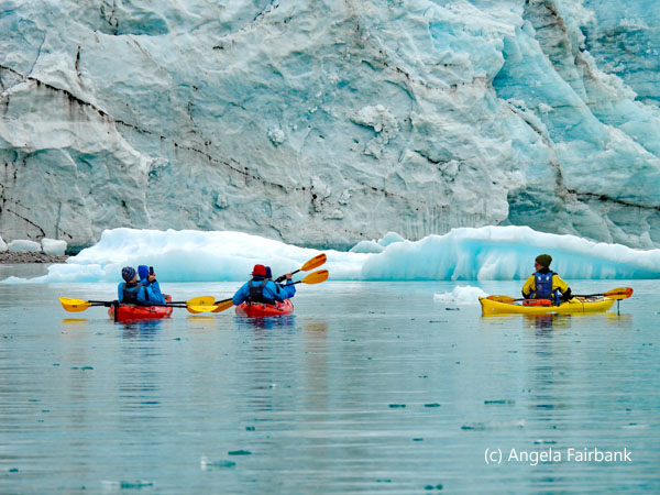 3 kayaks at glacier