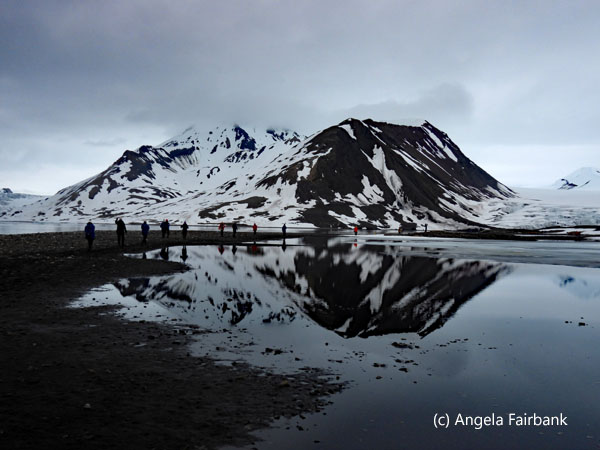 mountains reflected in water 1