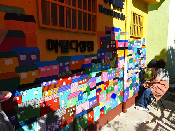 painting a shop wall
