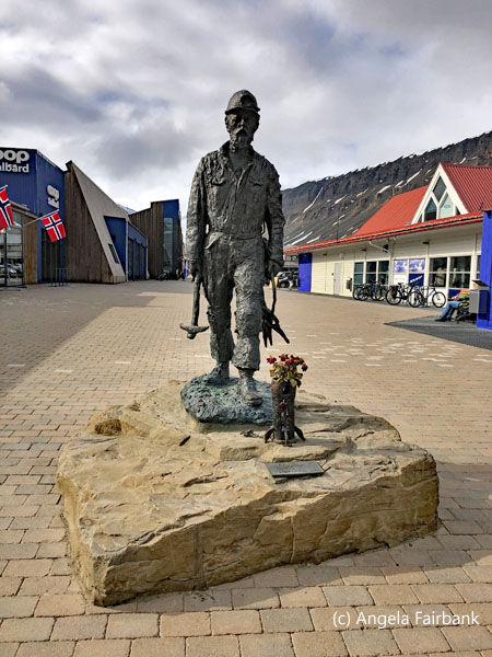 statue of miner on main street