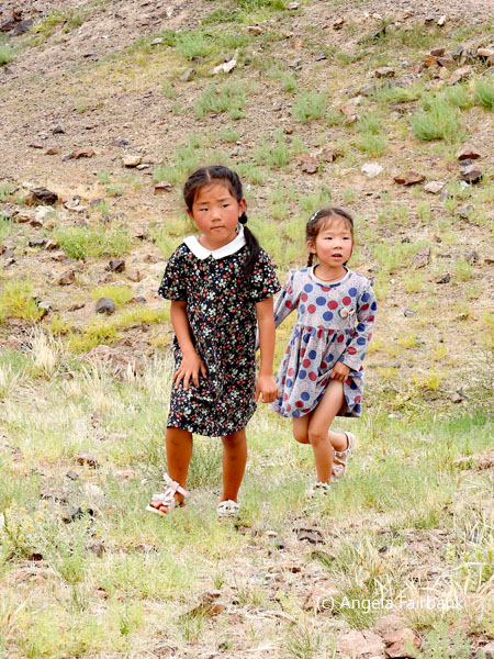 two girls in dresses
