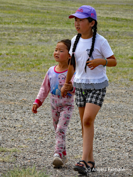two girls walking side by side