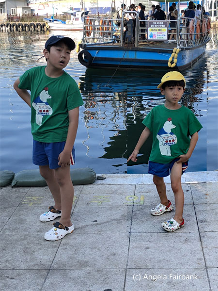 two boys at gaetbe ferry