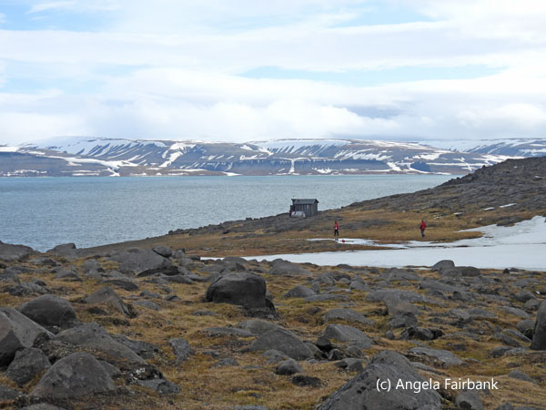 wide view from promontory with hut