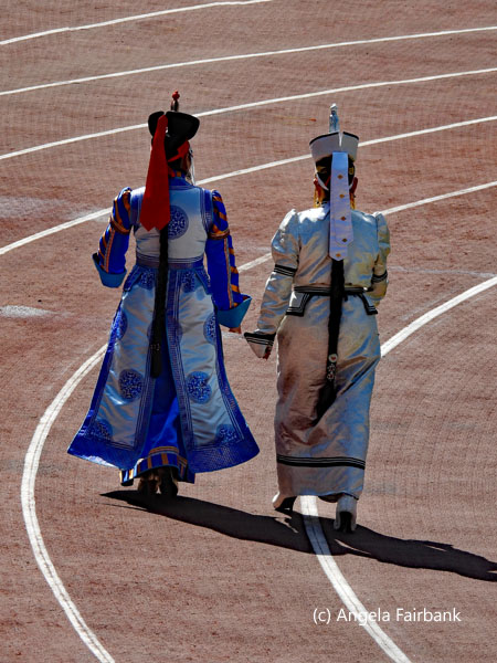 couple walking on race track