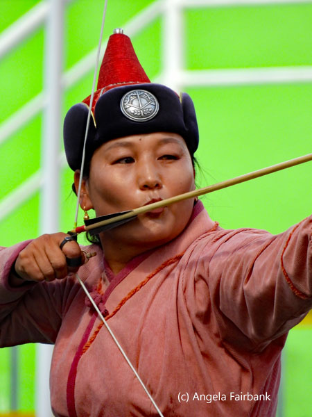 female archer in salmon 2