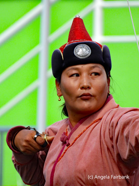 female archer in salmon 3