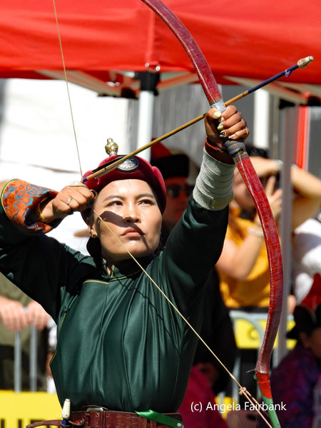 female archer in dark green 1