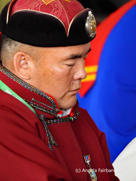 man in red tunic