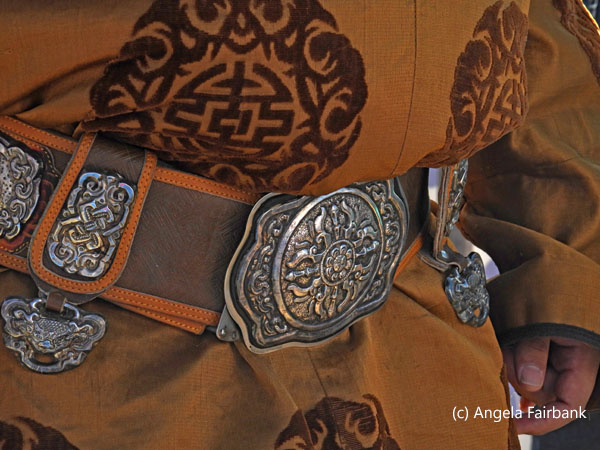 detail of tunic and belt