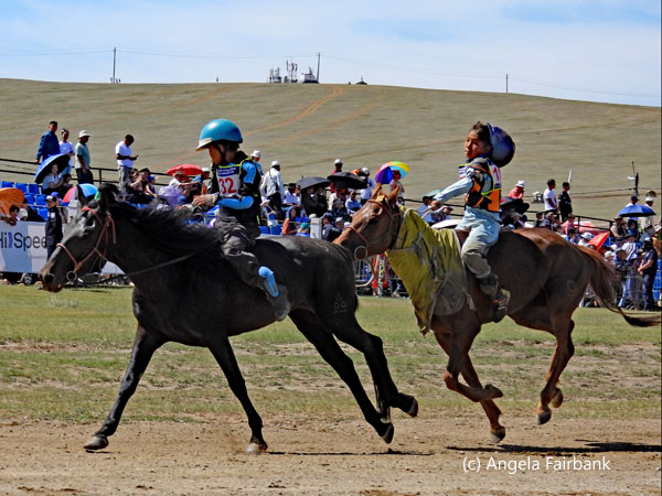 2 riders in a line
