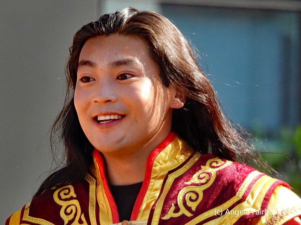 man in red and yellow robe