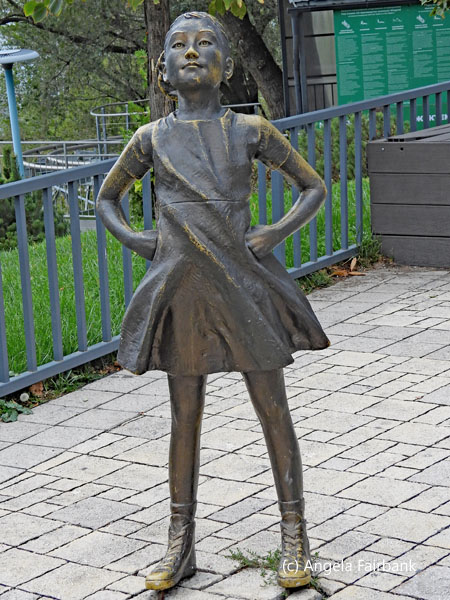 bronze statue of girl