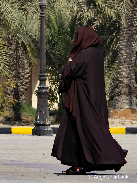 woman on way to mosque