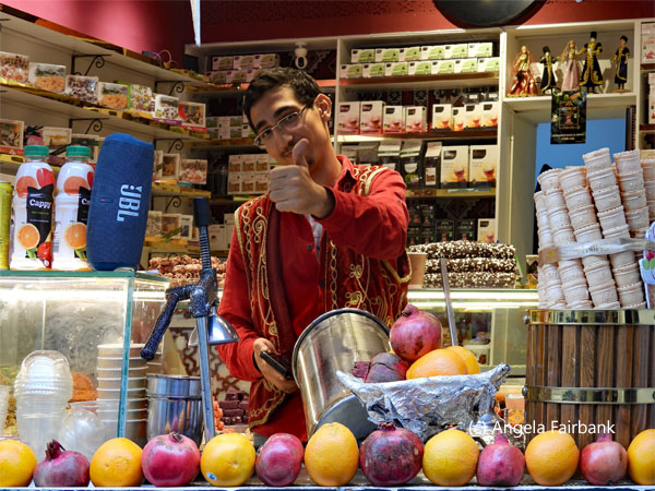 pomegranate and orange juice vendor