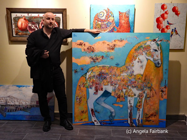Georgian vendor with painting of horse by his brother
