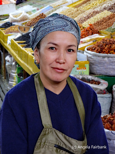 smiing woman at market