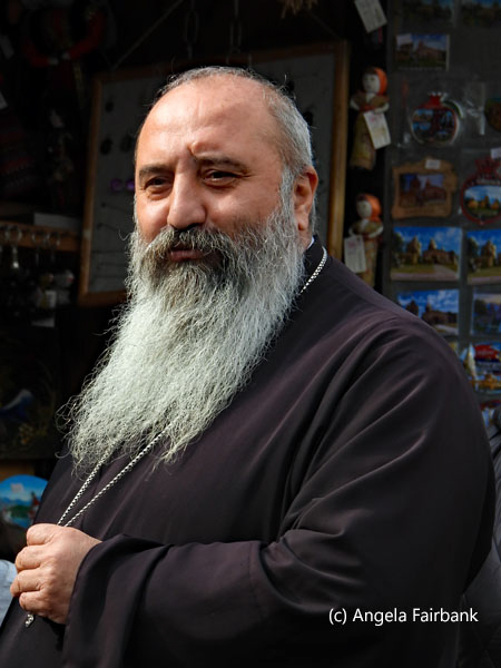 gentle priest at Goshavank Monastery