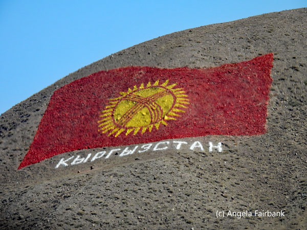 Kyrgyzstan flag art on the mountainside