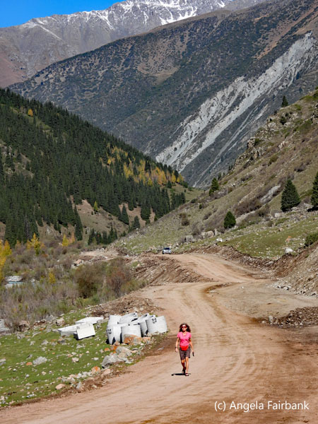 view of valley with woman in pink