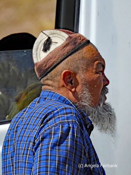 local man with beard in hat