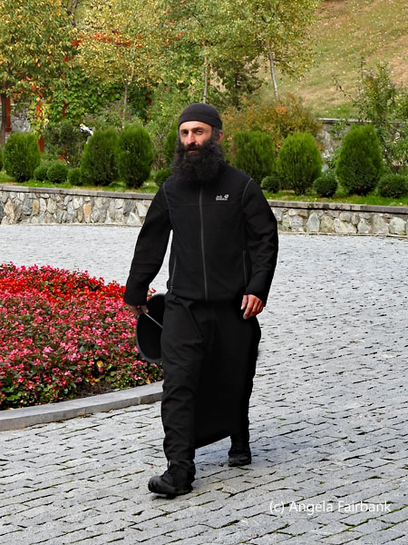 monk at Gergeti Trinity Church