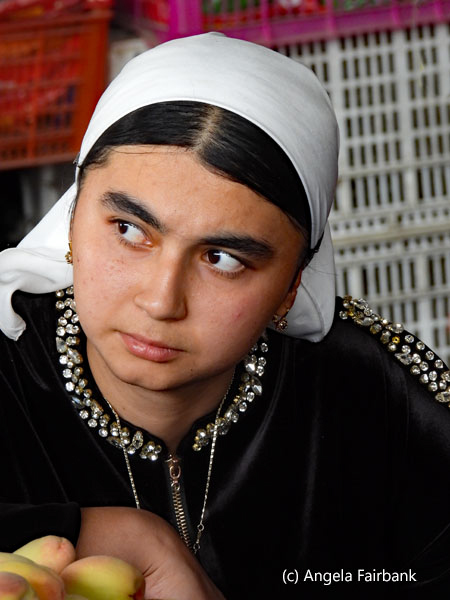 young woman in white headscarf