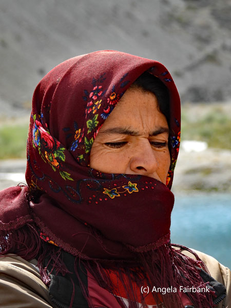 woman in pomegranate coloured scarf