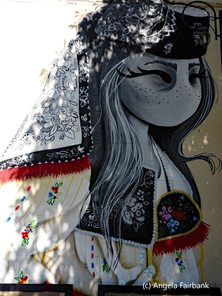 mural of girl in costume