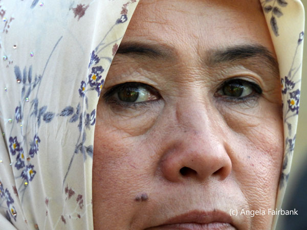 middle-aged woman with mascared eyes