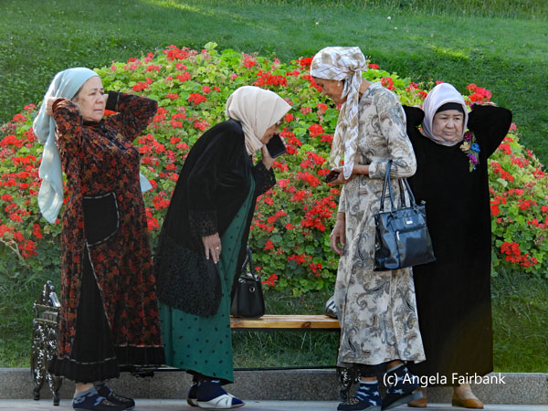 4 elderly ladues by bench