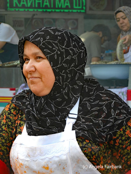 woman with blood-stained apron