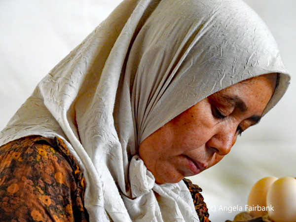 woman in white head scarf