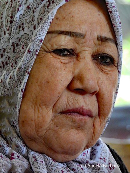 old woman wearing mascara