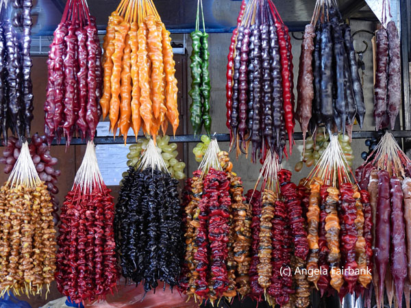 strings of candied dried fruit and nuts