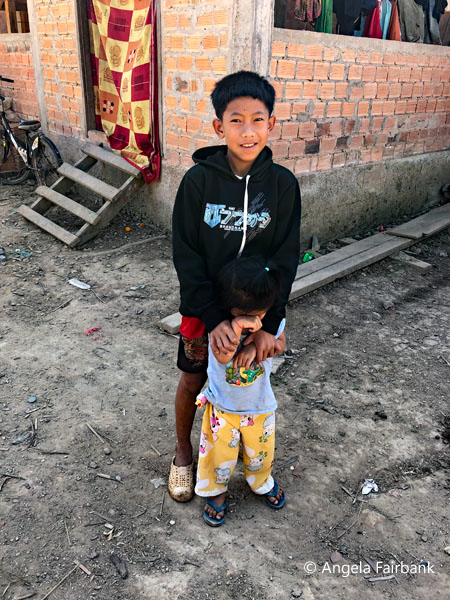 boy with his younger sibling
