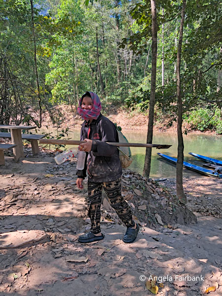 woman farmer arriving from river