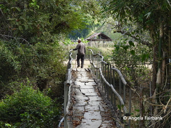 local man walkign across bridge