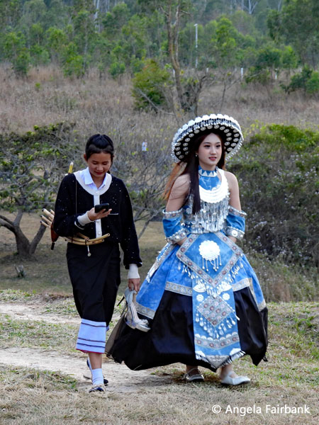 two young woman at plain of jars dressed up 1