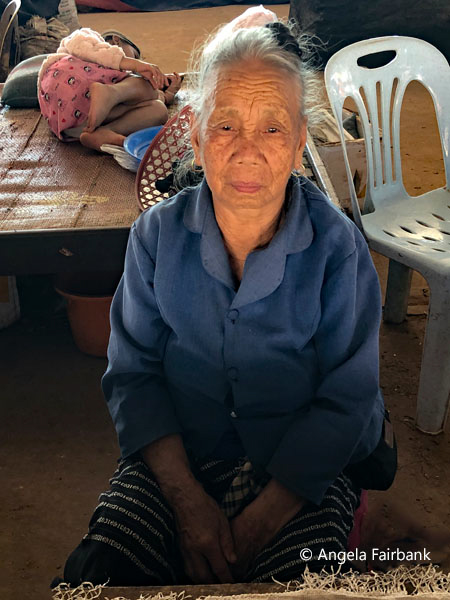 elderly hmong woman at market 1