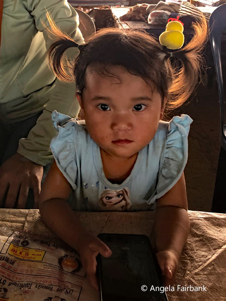young girl at hmong market