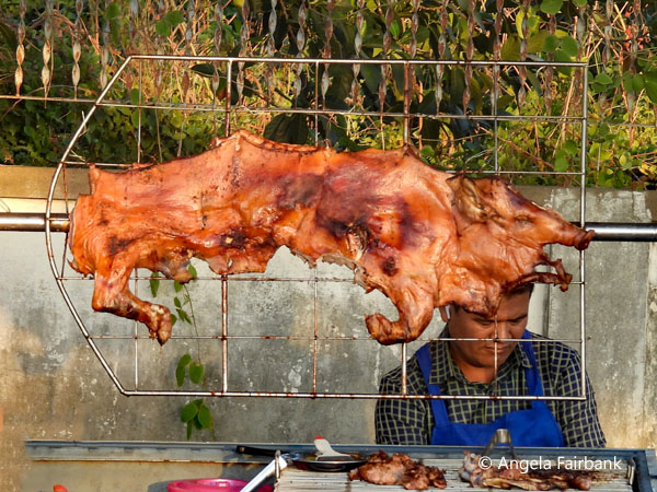roasted pressed pig for sale on street