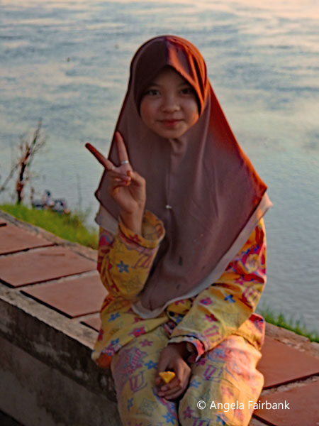 Muslim girl by the river