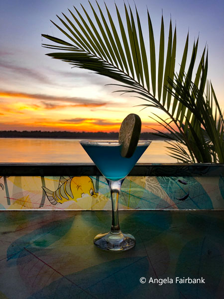 blue Margarita at sunset on the Mekong
