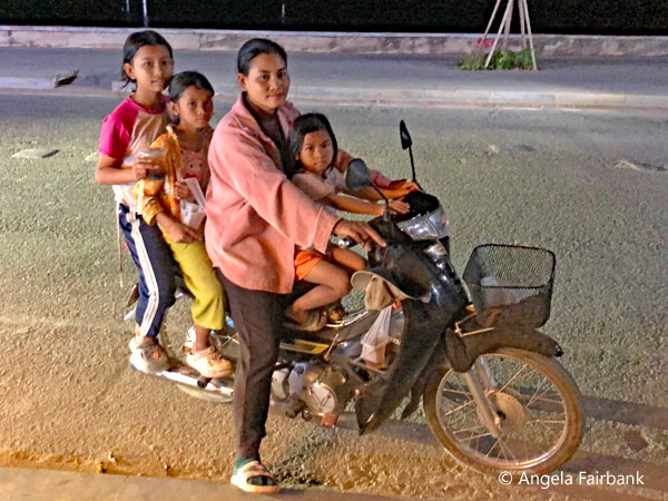 family of four on a motorbike