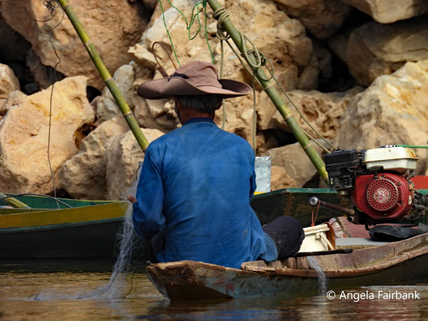 fisherman on the Mekong River