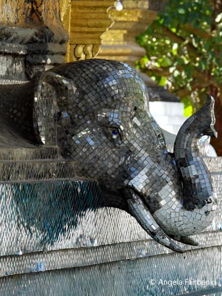 elephant in glass on temple at Wat Xiengthong