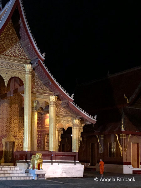temple with novice at night