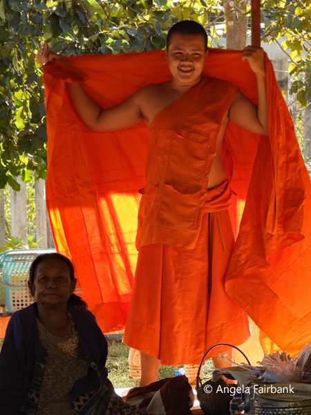 monk displaying his clothing